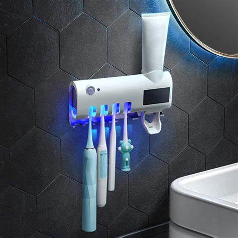 Porte brosses à dent mural avec stérilisateur UV et distributeur de dentifrice intégrés